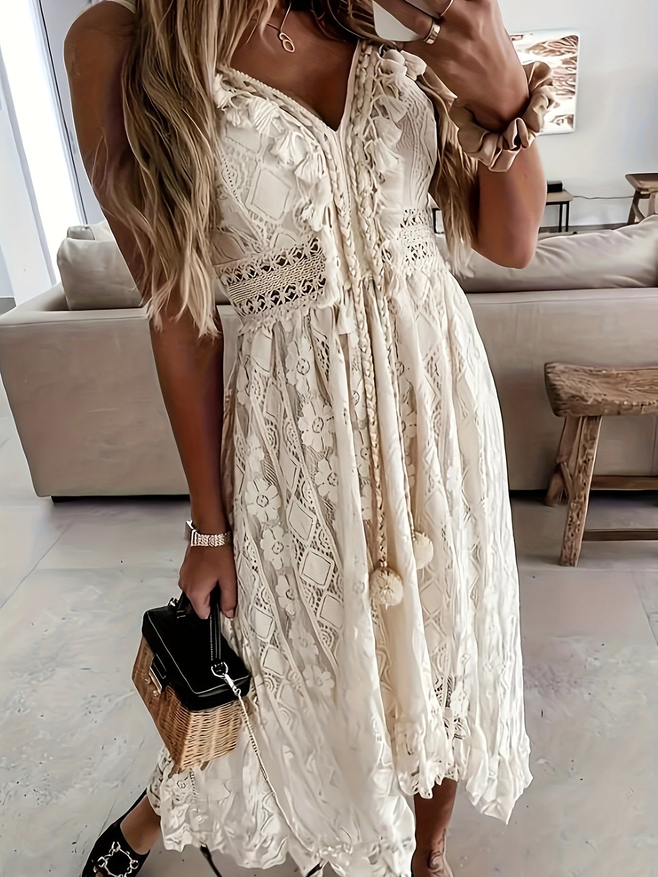 Chic Sleeveless Lace Cami Dress - Elegant Dipped Hem & Tassel Detail - Versatile for Evening & Casual Wear