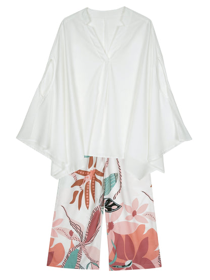 chic Womens Two-piece Outfit Set - Relaxed Fit V-neck Top with Boho Batwing Sleeves & Exotic Tropical Print Wide Leg Pants - Casual Fashion Clothing Ensemble