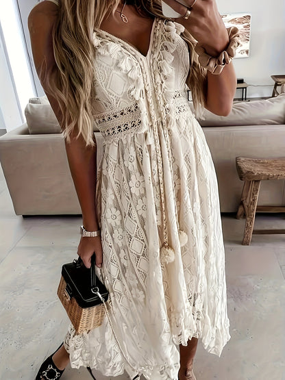 Chic Sleeveless Lace Cami Dress - Elegant Dipped Hem & Tassel Detail - Versatile for Evening & Casual Wear