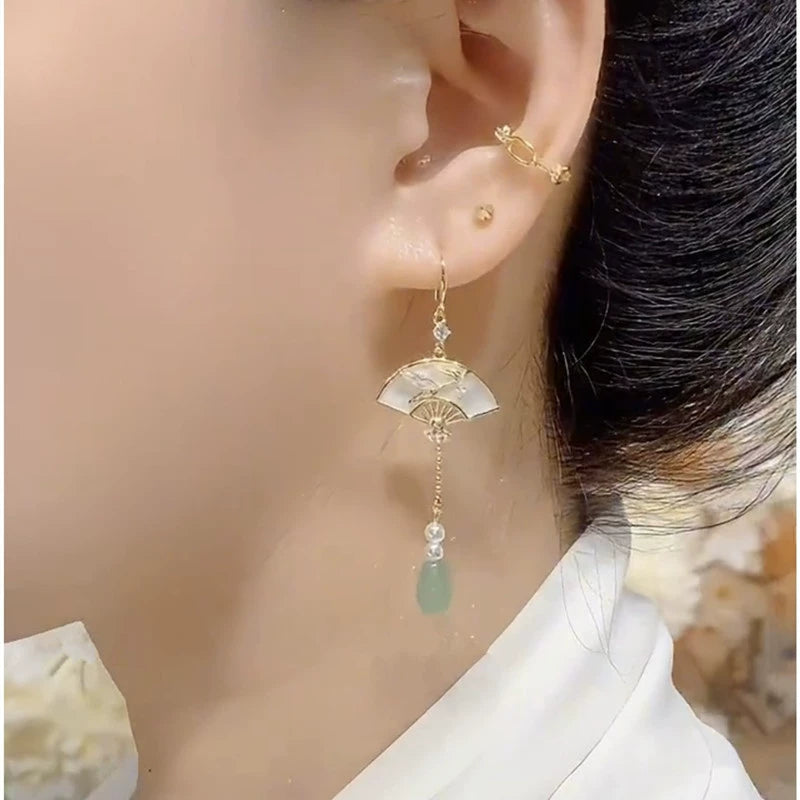 Temperament New Chinese fan-shaped fringed earrings women's fashion high-end ear hook earrings 2025 new light luxury earrings