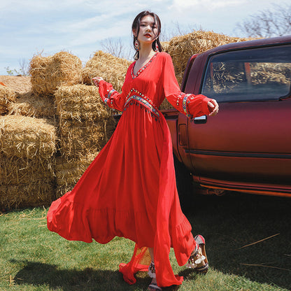 2025 Summer Sanya beach skirt women's seaside vacation skirt super fairy big red travel photo dress ethnic style red dress