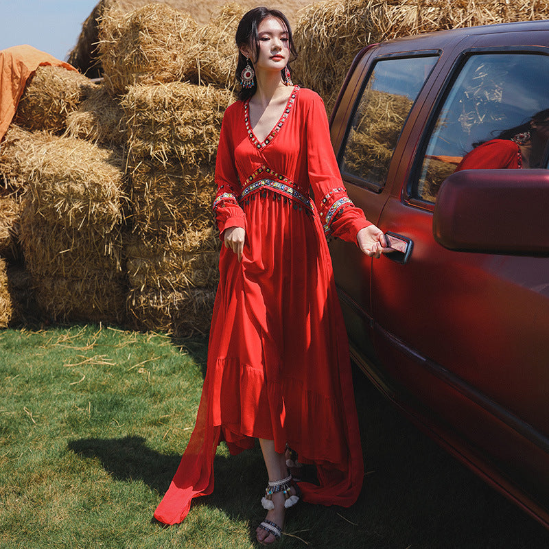 2025 Summer Sanya beach skirt women's seaside vacation skirt super fairy big red travel photo dress ethnic style red dress