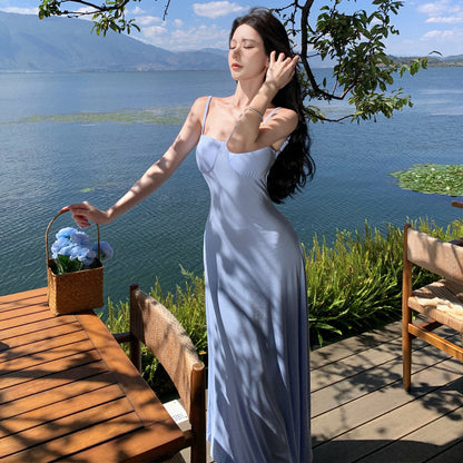 2025 With chest pad suspender skirt women's summer seaside vacation wind sexy slim spice backless dress a word long skirt