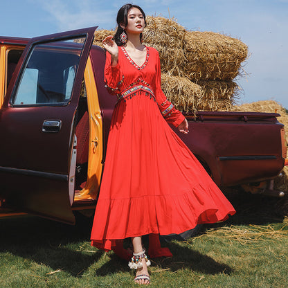 2025 Summer Sanya beach skirt women's seaside vacation skirt super fairy big red travel photo dress ethnic style red dress