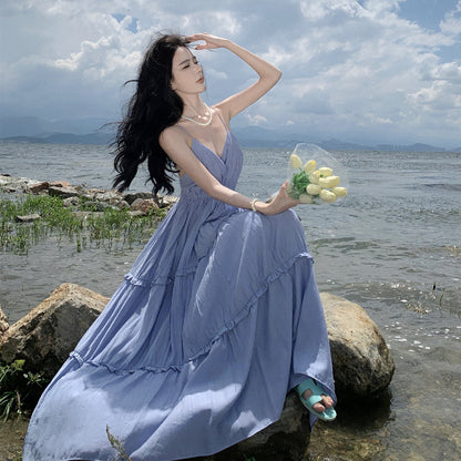 2025 Sanya seaside vacation skirt summer new sexy backless splicing ruffle leaf edge slim pendulum V-neck long skirt suspender skirt