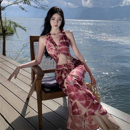 2025 Sexy hollow waist printing bow split hip dress summer new temperament backless vacation dress
