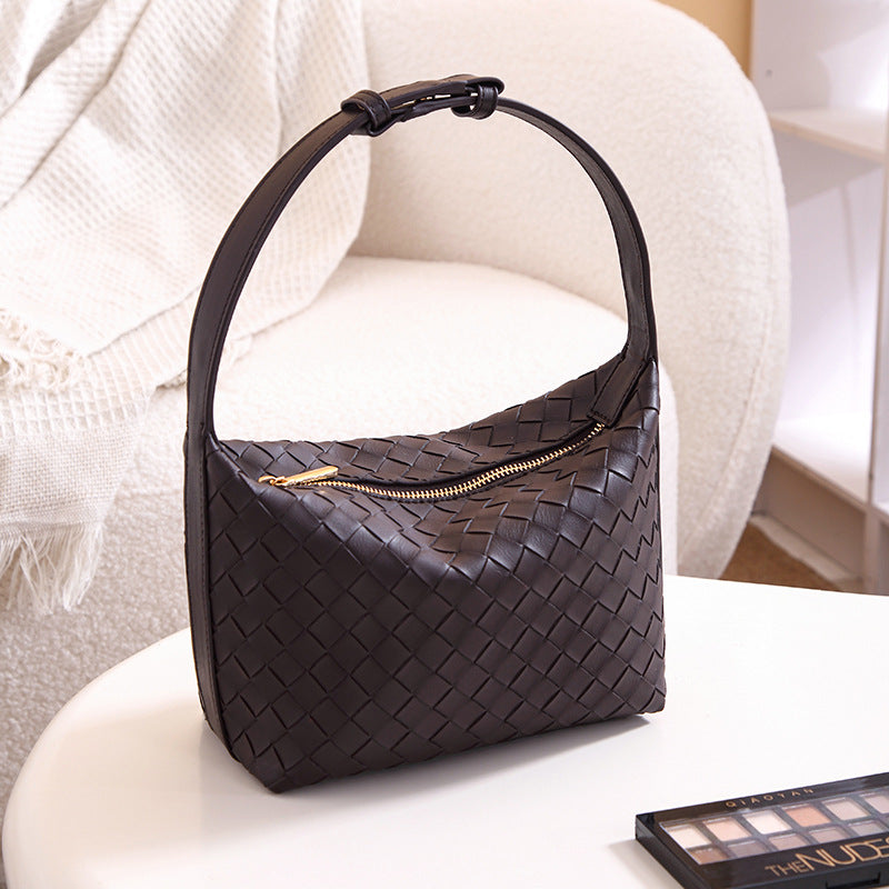 2025 Bag Autumn Women's popular Premium Soft Weaving Handbag Niche Leisure Travel Practical Textured Pillow Bag