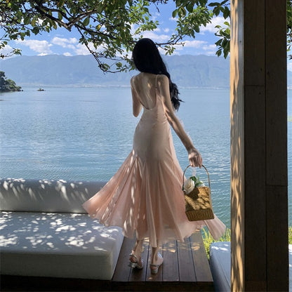 2025 Fairy fluttering temperament big halter pink suspender skirt female summer waist thin beach dress long dress elegant