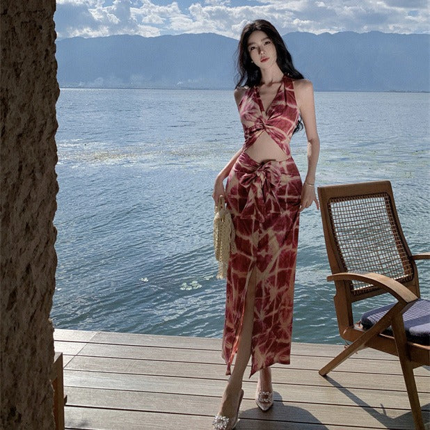 2025 Sexy hollow waist printing bow split hip dress summer new temperament backless vacation dress