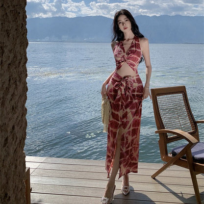 2025 Sexy hollow waist printing bow split hip dress summer new temperament backless vacation dress