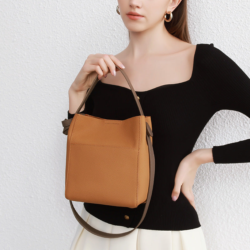 Leather bag women's popular new commuter women's bag premium texture messenger bag large capacity shoulder portable bucket bag