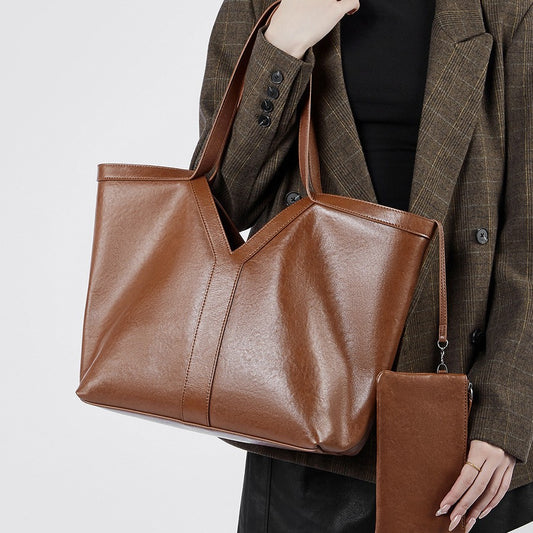 2025 Large capacity underarm women's bag autumn and winter new leather versatile tote bag commuter texture portable bag