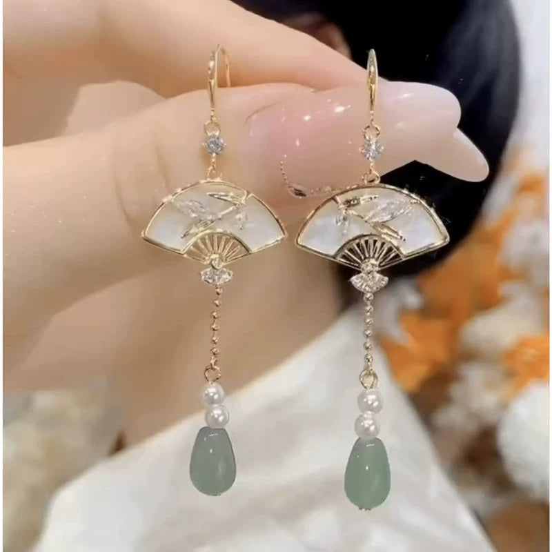 Temperament New Chinese fan-shaped fringed earrings women's fashion high-end ear hook earrings 2025 new light luxury earrings
